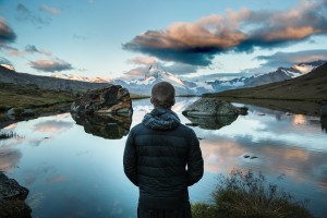 person looking out at water